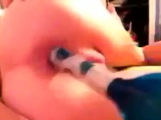 Fucking her ass with hairbrush
