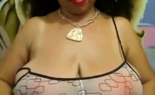 Big-Breasted Black Mature Woman Shows Off on Webcam